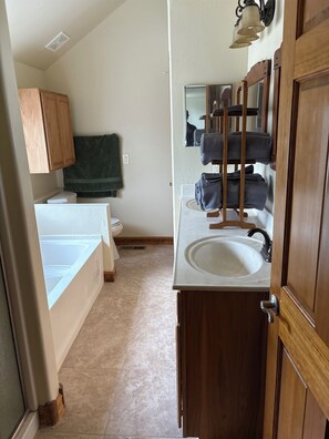 Shower, towels, soap, toilet paper