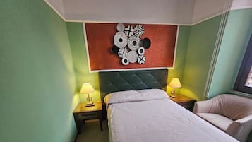 Economy Room | In-room safe, blackout drapes, cribs/infant beds, free WiFi