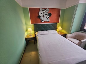 Economy Room | In-room safe, blackout drapes, cribs/infant beds, free WiFi