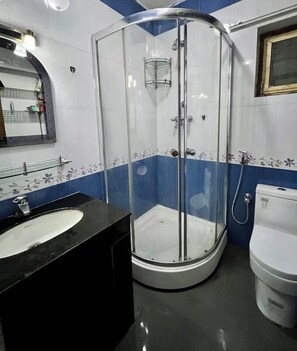 Hair dryer, towels, soap, shampoo