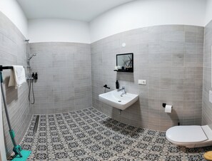 Shower, hair dryer, slippers, heated floors