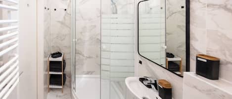 Shower, hair dryer, towels, soap