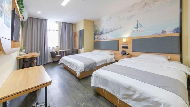 A hotel room with two beds, a desk, and a chair. There is a painting on the wall and a window with curtains. - Yi An Hotel (Suzhou)