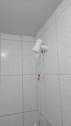 Shower, towels, toilet paper