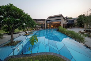 Outdoor pool, open 7:00 AM to 7:00 PM, sun loungers