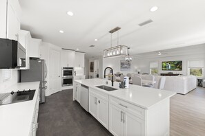 Fridge, microwave, oven, stovetop - Premier 6BR Resort Home • Pool & Views (Palm Coast)