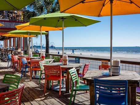 Outdoor dining. Location Location! Walk to everything! 1 BDRM/1 BA in Historic Strand, Sleeps 4!