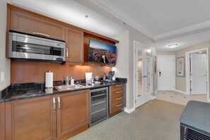 Fridge, microwave, stovetop, coffee/tea maker