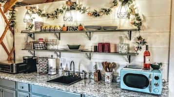 Fridge, microwave, stovetop, coffee/tea maker