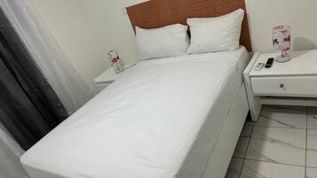 Standard Single Room, 1 Double Bed | Bathroom | Shower, towels, soap, shampoo
