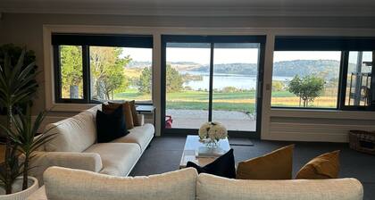 Peaceful farmhouse retreat with breathtaking lake views—charm meets tranquility✨