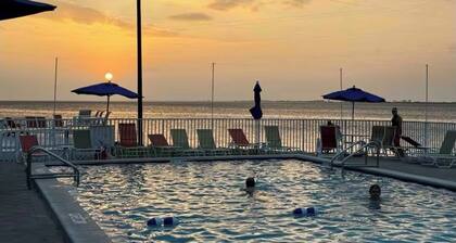 Just minutes from all stadiums with private beach and pool. Beautiful views!