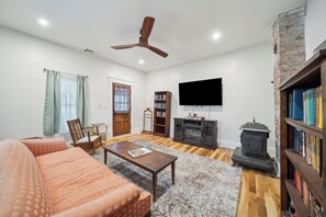 Smart TV, fireplace, DVD player, books