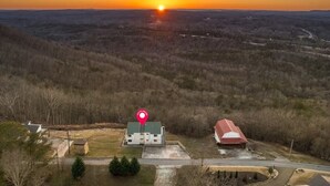 An aerial view of a rural area with a house and barn during sunset. - Best Views, Golf/Theater/GameRoom/HotTub7min to Town (Ellijay)