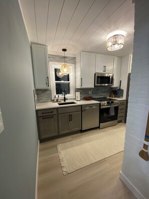 Fridge, microwave, oven, stovetop - Charming Home in the heart of SoHa, fully-remodeled w/ everything you need! (South Haven)