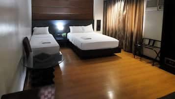 Kamar Triple Eksekutif, Bebas Asap Rokok, pemandangan kota | Seprai premium, bantalan ekstra lembut, meja kerja, dan Wi-Fi gratis