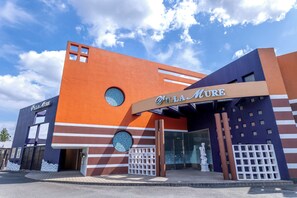 A modern building with a prominent sign reading "Villa Mure." - HOTEL Villamure – Adults Only (Ogori)