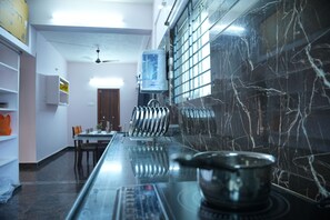Deluxe Room | Private kitchen | Shared fridge, microwave - SAMASTA HOME STAY (Tirupati)