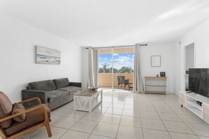 Apartment, Balcony, Bay View | Living room | 55-inch LED TV with digital channels, Netflix, Hulu - Bay Harbor Sunset Two Bedrooms Apt (Bay Harbor Islands)