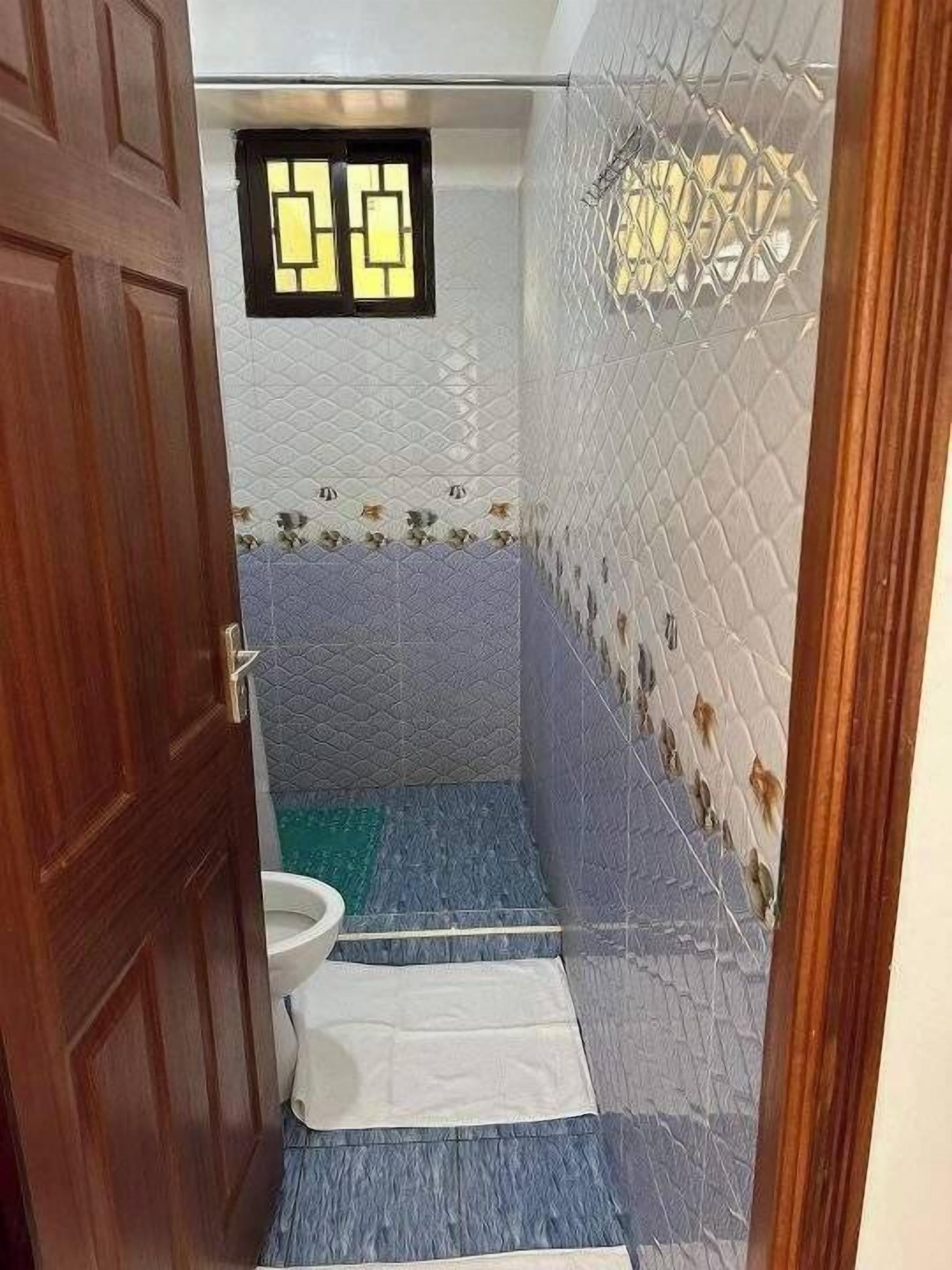 Shower, slippers, towels, soap