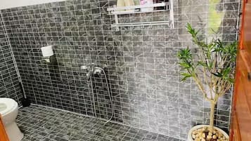 Basic Shared Dormitory, Garden View | Bathroom | Shower, hair dryer, slippers, towels
