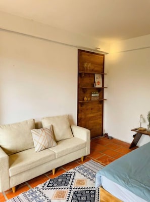 Deluxe Single Room, Garden View | Laptop workspace, blackout drapes, soundproofing, iron/ironing board