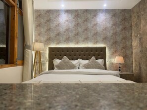 Deluxe Quadruple Room, Balcony, Mountain View | Desk, free WiFi - Griham Inn (Shimla)