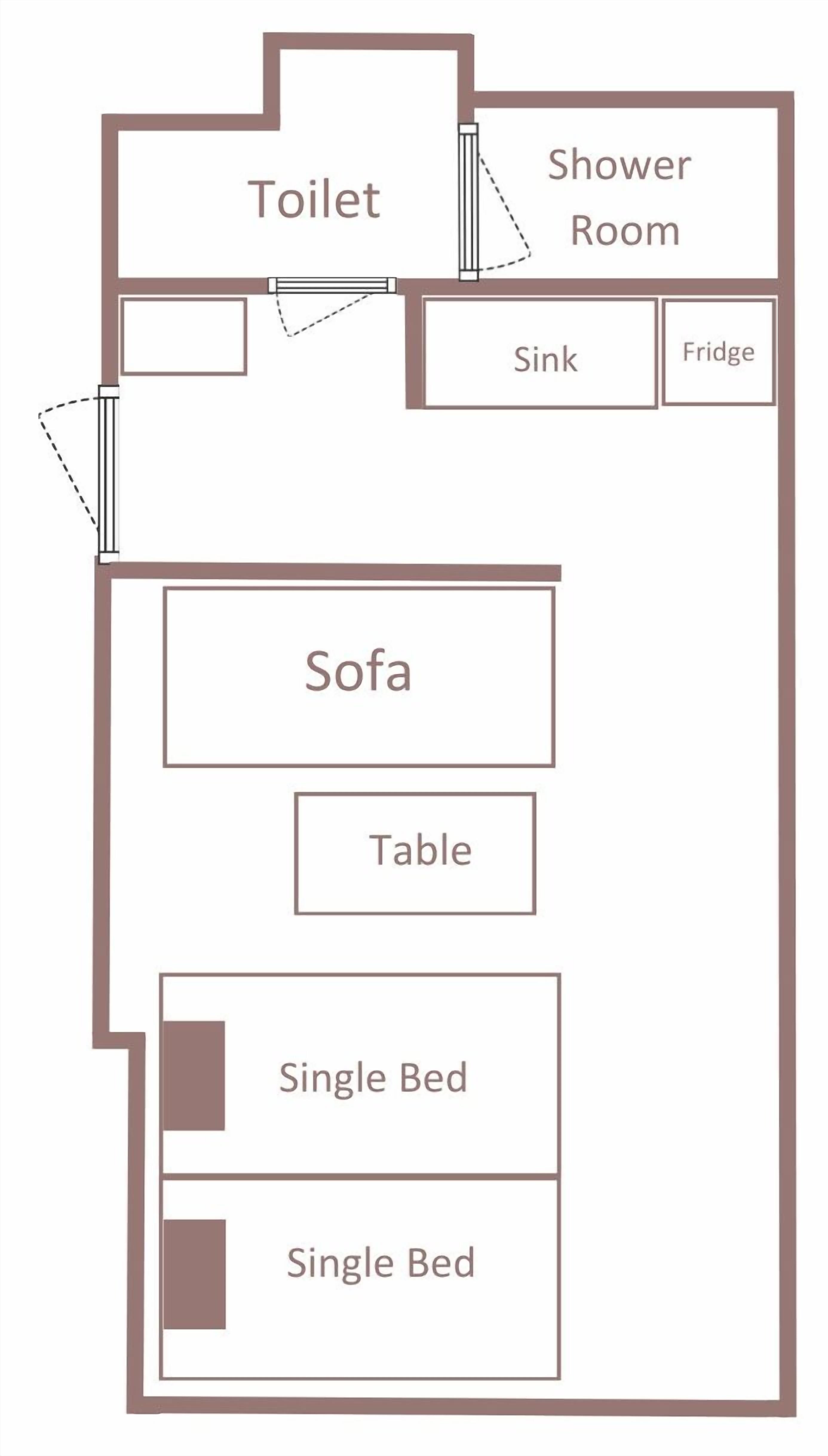 A floor plan with a toilet, shower room, sink, fridge, sofa, table, and two single beds.
