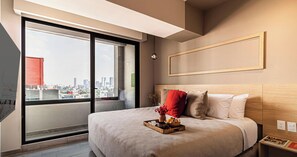 1 bedroom, desk, iron/ironing board, travel crib