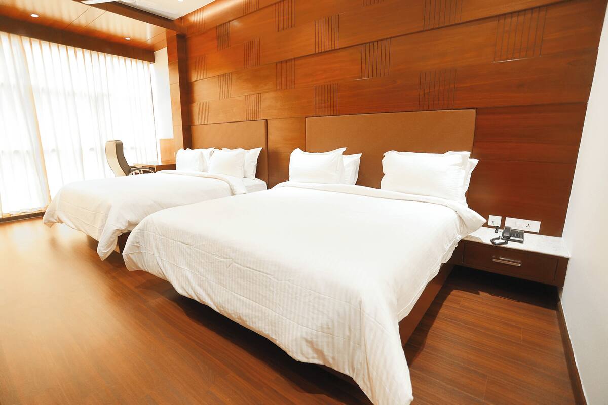 Premium bedding, laptop workspace, free WiFi, individually furnished