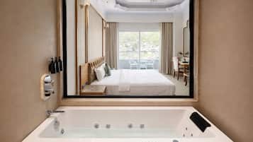 Luxury Room | Bathroom | Shower, towels, toilet paper