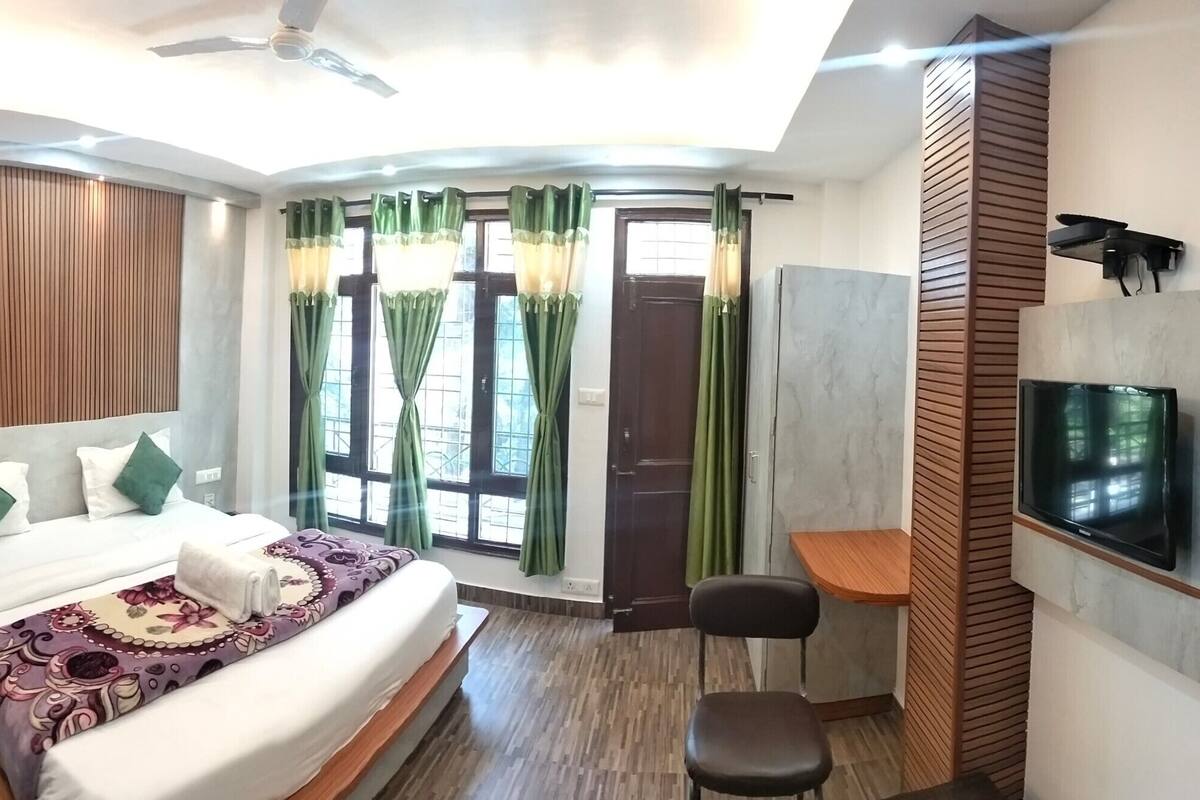 Habitación familiar, vista a la montaña | Wifi gratis y ropa de cama