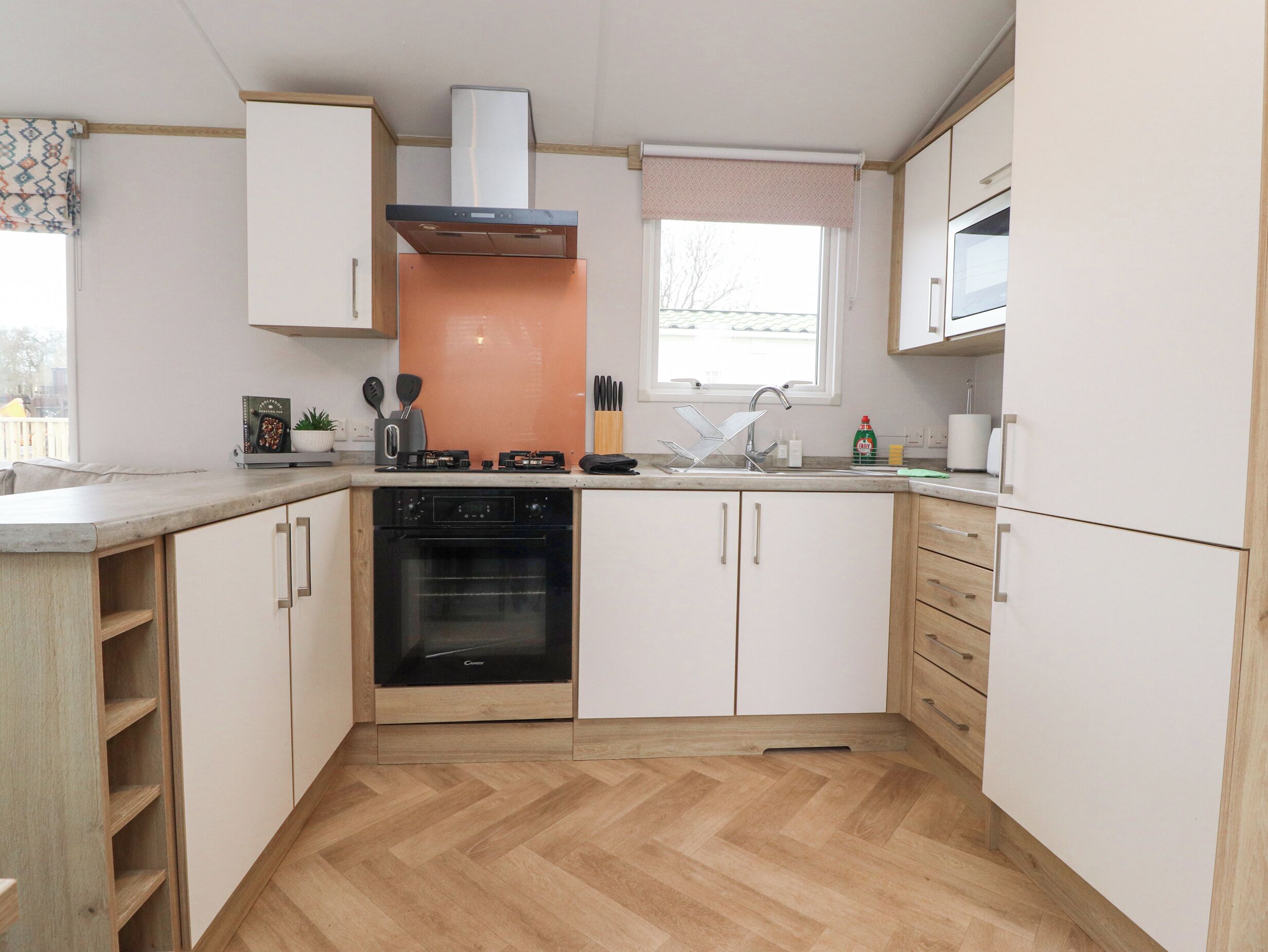 Fridge, electric kettle, cookware/dishes/utensils