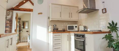 Fridge, electric kettle, toaster, cookware/dishes/utensils