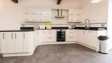 Fridge, electric kettle, toaster, cookware/dishes/utensils