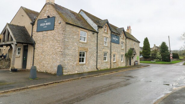 A stone building with a sign reading "The Old Dog." - The Loft at The Old Dog Thorpe (Ashbourne)