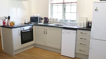 Fridge, dishwasher, electric kettle, cookware/dishes/utensils