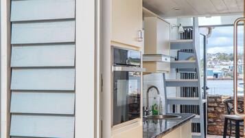 Fridge, electric kettle, toaster, cookware/dishes/utensils