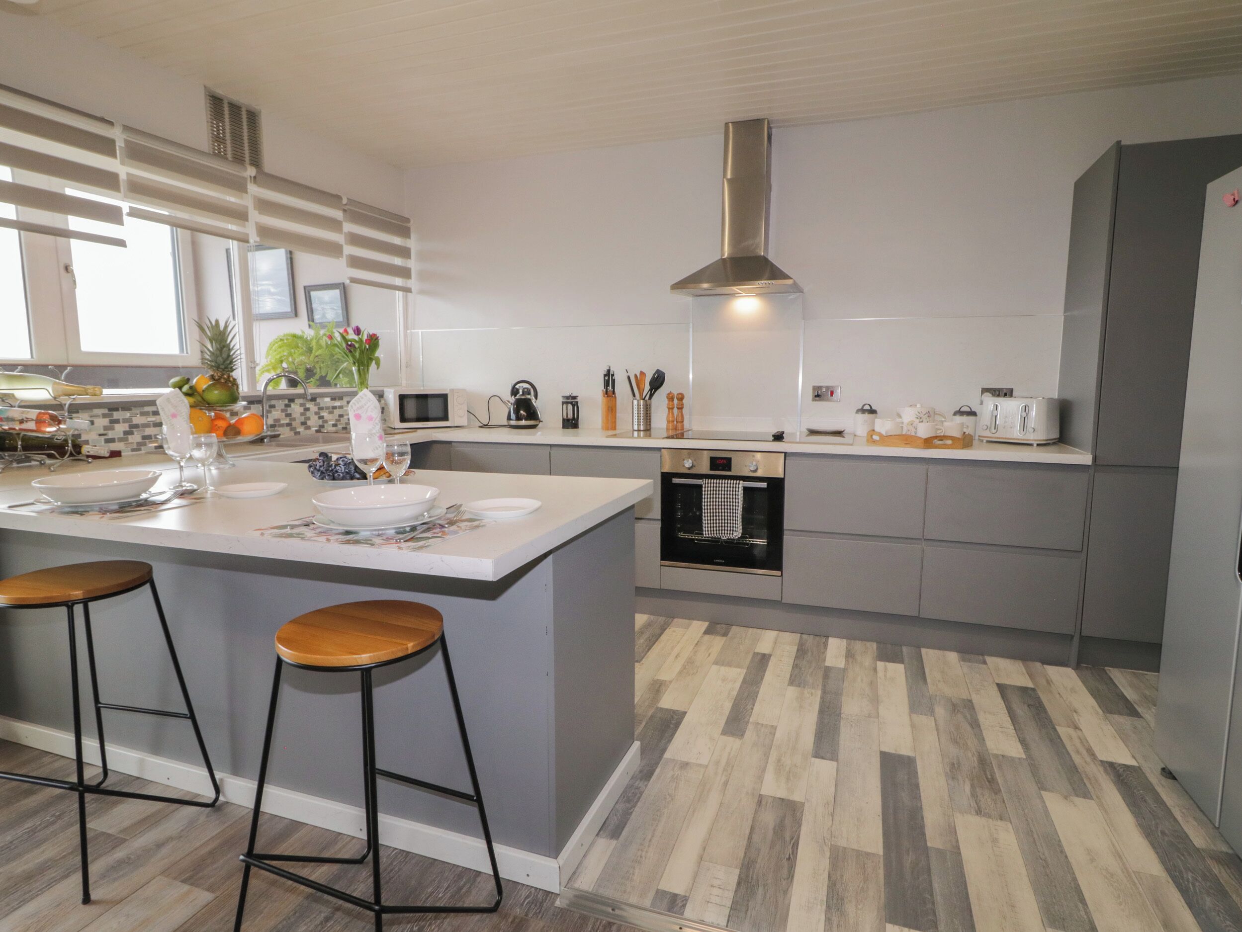 Fridge, electric kettle, cookware/dishes/utensils