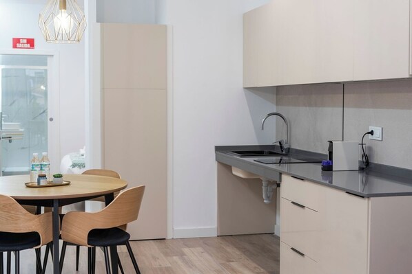 Fridge, microwave, coffee/tea maker, toaster