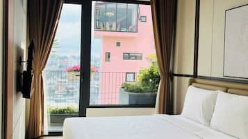 Deluxe Double Room Single Use, Balcony, City View | 1 bedroom, blackout drapes, soundproofing, iron/ironing board