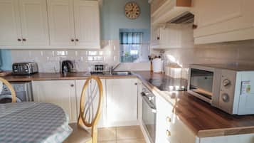 Fridge, dishwasher, toaster, cookware/dishes/utensils