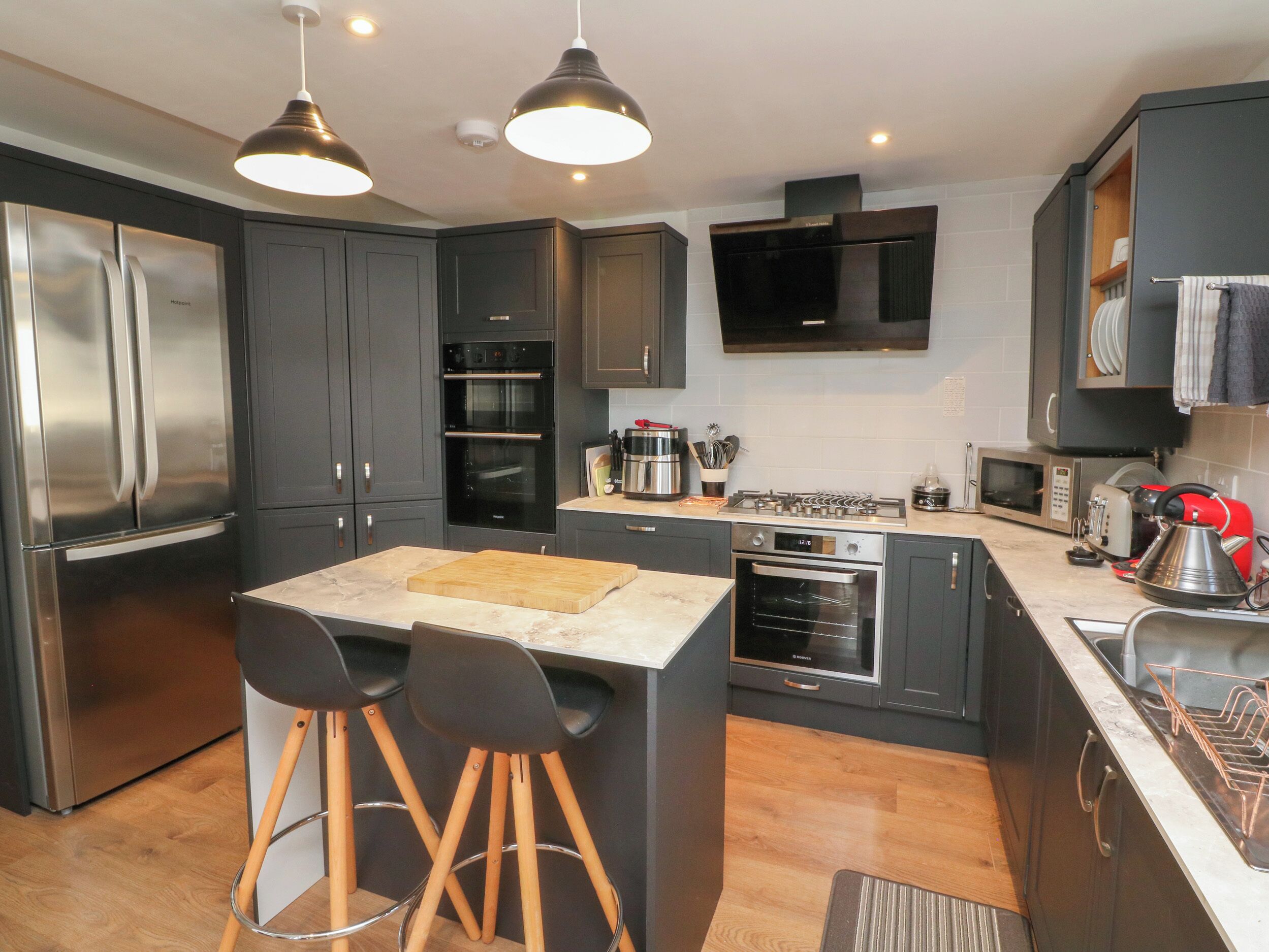 Fridge, electric kettle, toaster, cookware/dishes/utensils