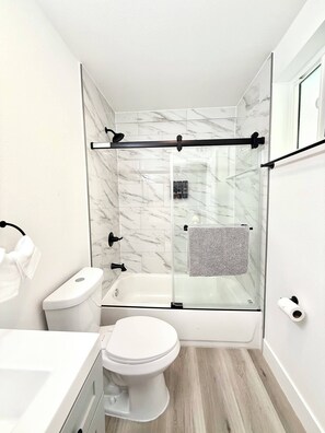 Rainfall showerhead, hair dryer, towels, soap