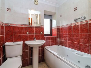 Shower, hair dryer - The Hayloft Cottage Apartment (Lyme Regis)