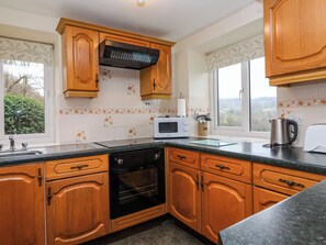 Fridge, electric kettle, cookware/dishes/utensils