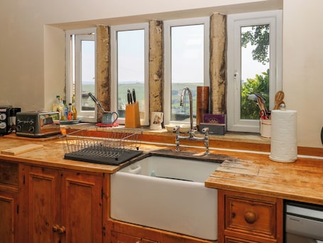 Fridge, electric kettle, toaster, cookware/dishes/utensils