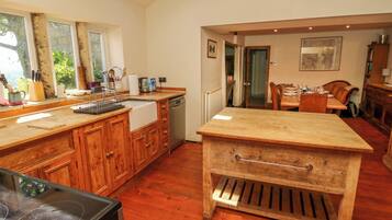 Fridge, electric kettle, toaster, cookware/dishes/utensils