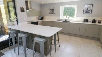 Fridge, dishwasher, cookware/dishes/utensils