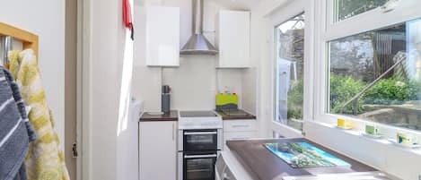 Fridge, electric kettle, toaster, cookware/dishes/utensils